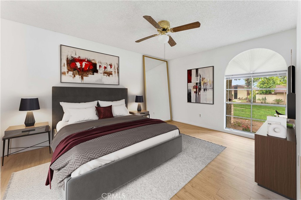1428 Fredricks Lane Upland, CA 91786 - Photo 7 of 29 a spacious bedroom with a bed and a large window