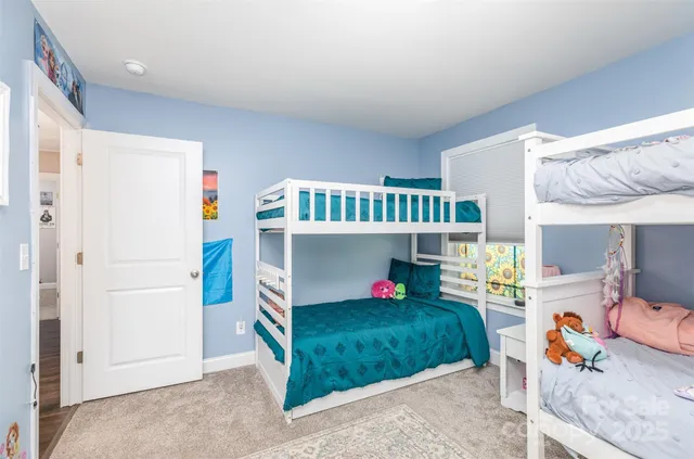 a swimming pool view with a outdoor seating