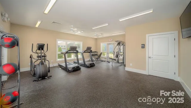 a view of a swimming pool with a patio