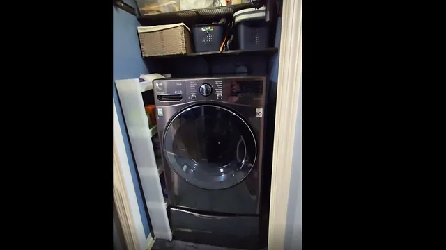 a bathroom with a granite countertop toilet a sink and a mirror