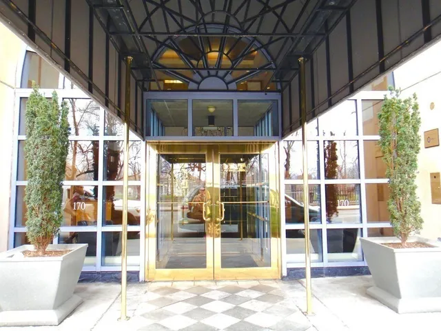 a view of hall way with furniture