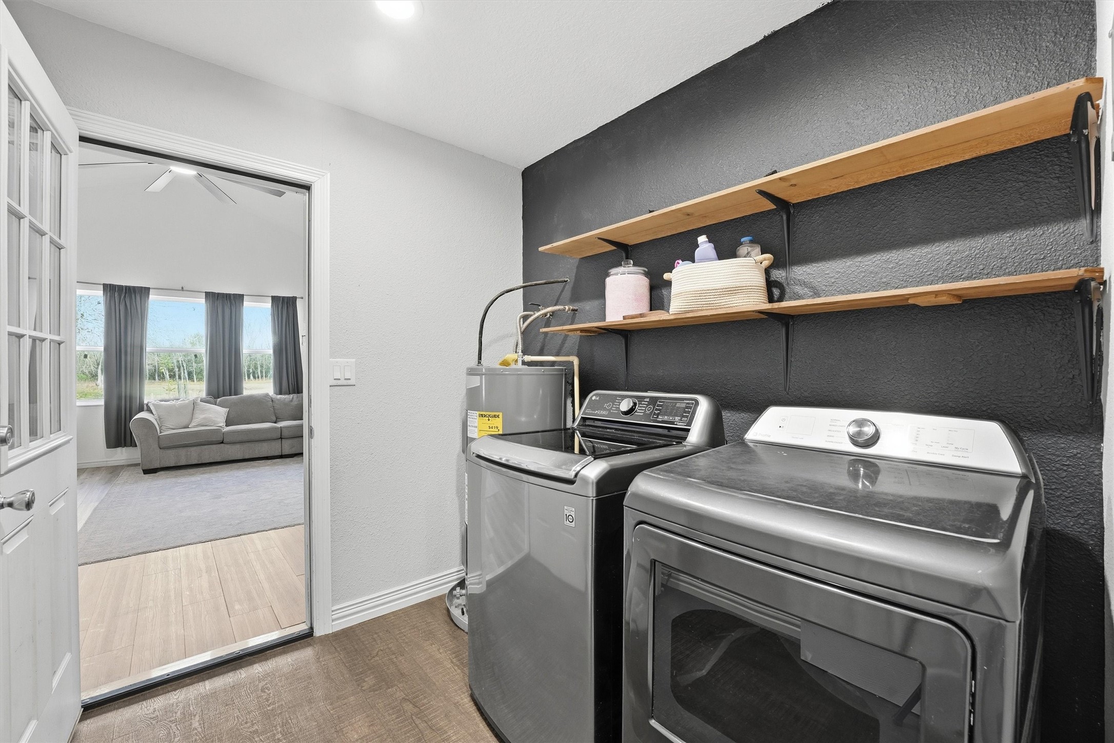 611 Reidland Road Crosby, TX 77532 - Photo 21 of 33 a utility room with dryer and washer