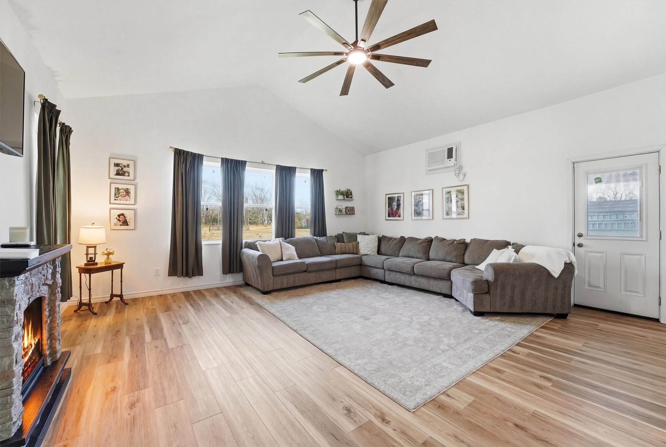611 Reidland Road Crosby, TX 77532 - Photo 7 of 33 a living room with furniture and a wooden floor