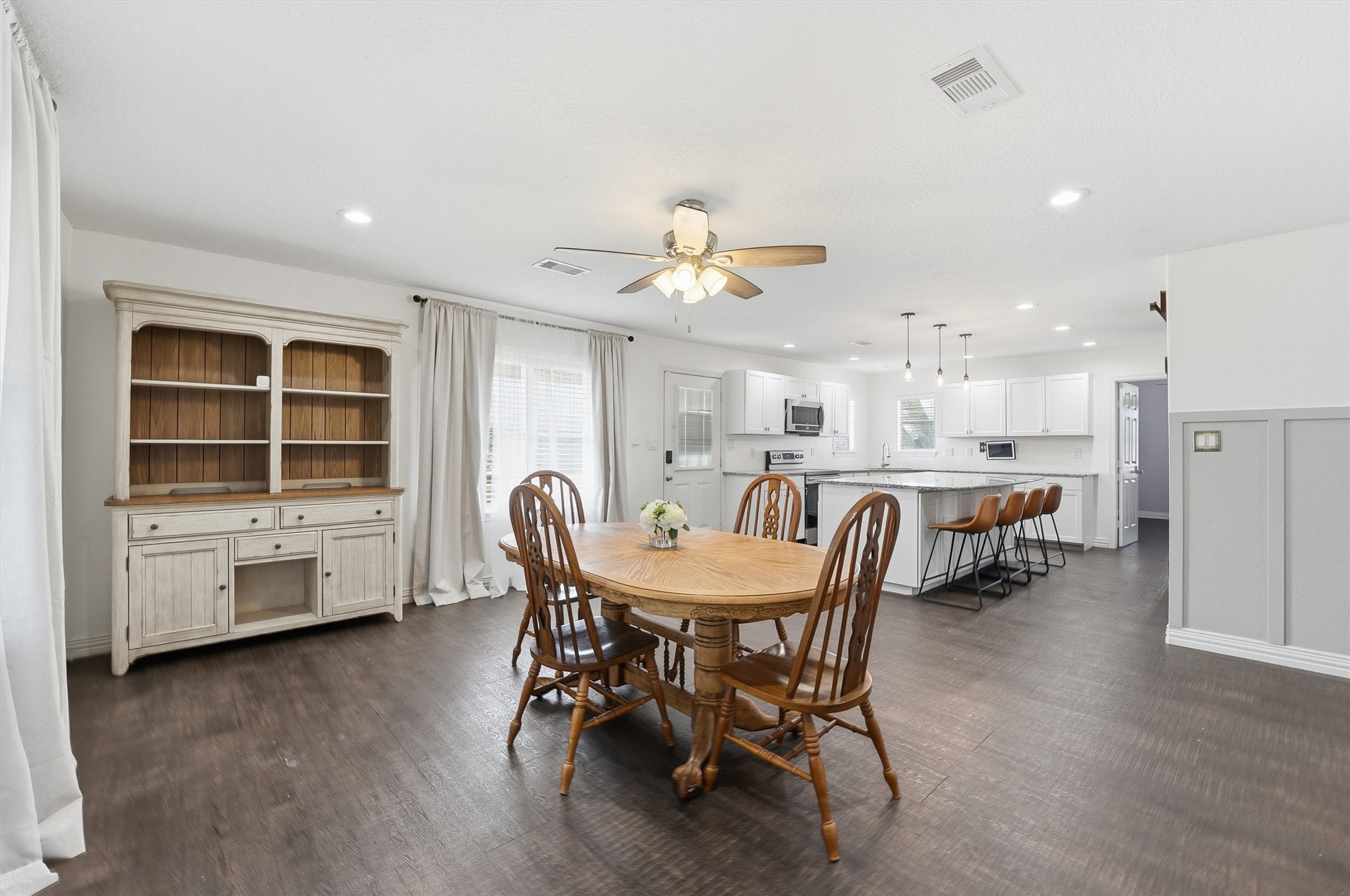 611 Reidland Road Crosby, TX 77532 - Photo 9 of 33 a view of a dining room with furniture and a livingroom