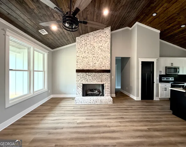 a view of a livingroom with a fireplace