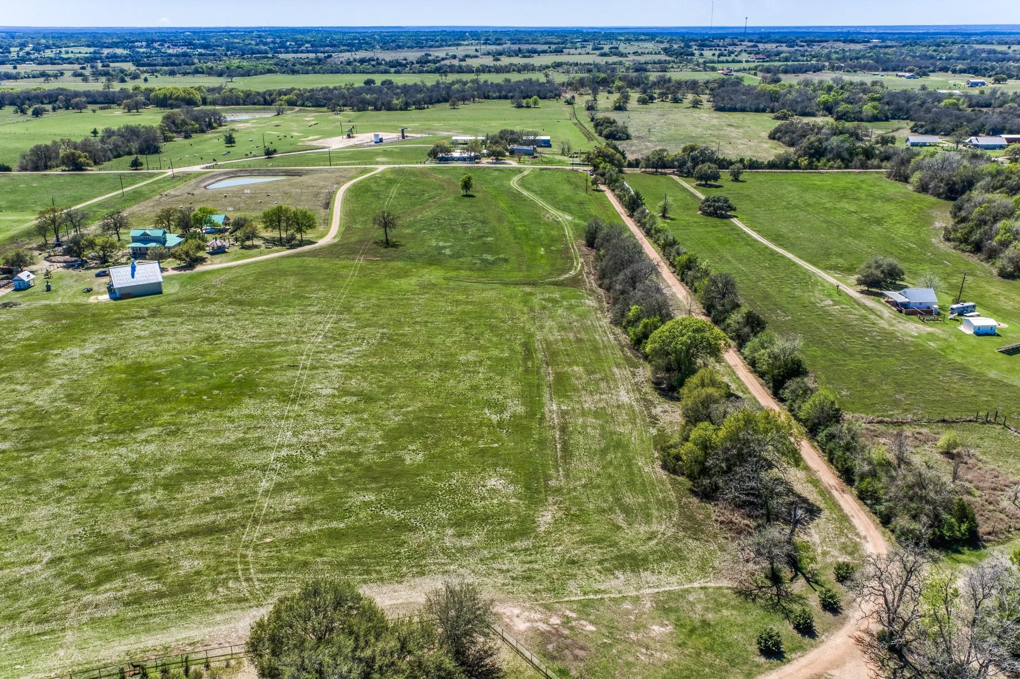 11646 Schuster Road Round Top, TX 78954 - Photo 2 of 8 a view of a city