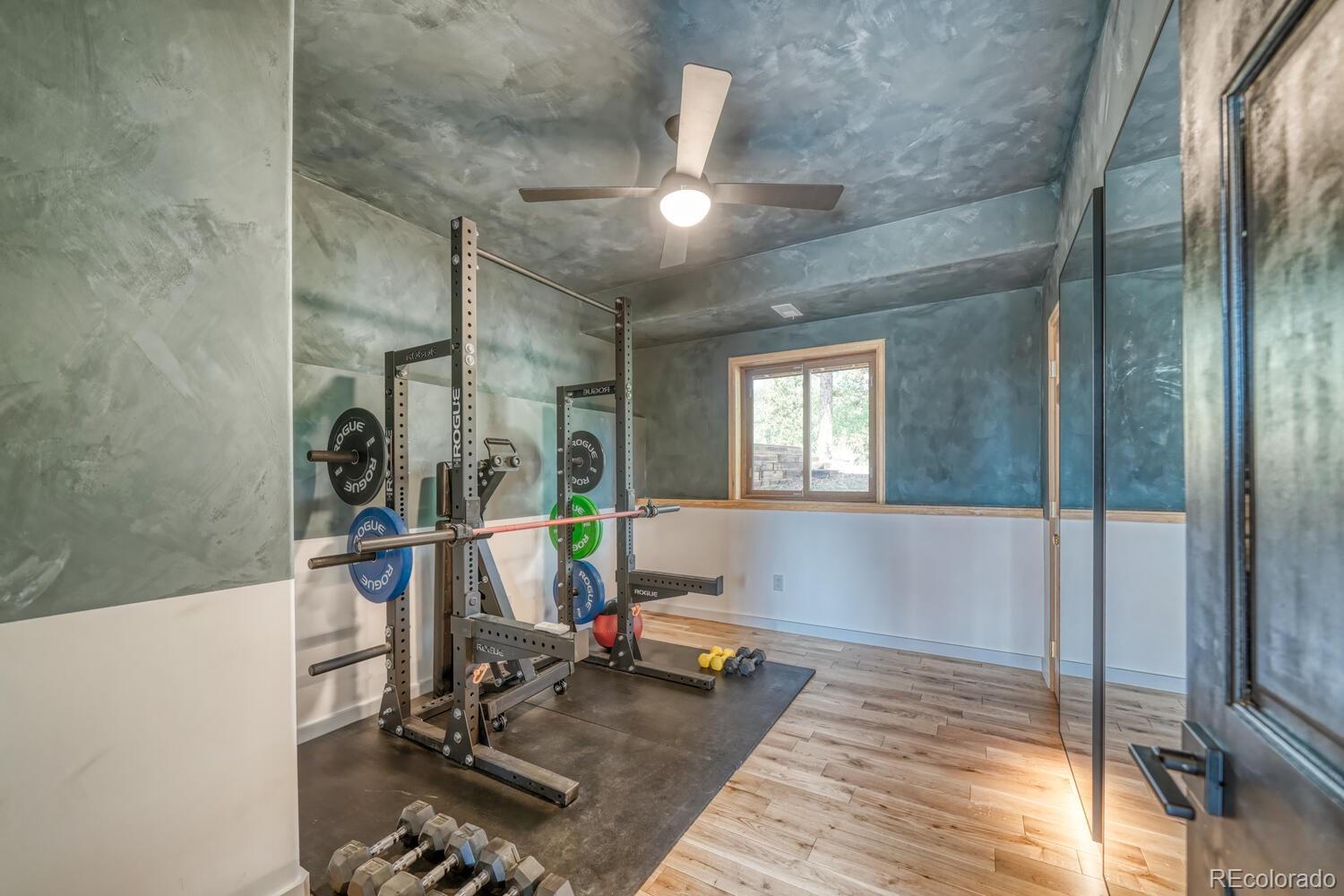 50 Ridge Lane Bailey, CO 80421 - Photo 21 of 37 a view of a room with gym equipment
