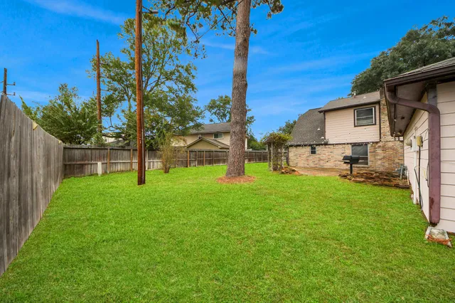 a view of a kitchen with closet and window