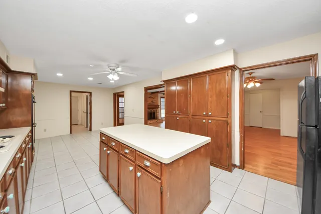 a bathroom with a sink a mirror and a shower