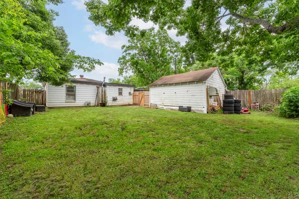 a house view with a garden space