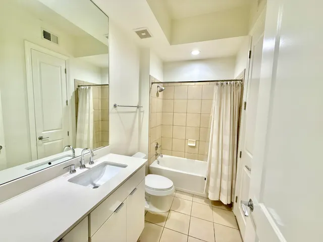 a kitchen with a stove and a microwave