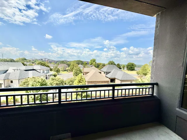 a view of city from a balcony