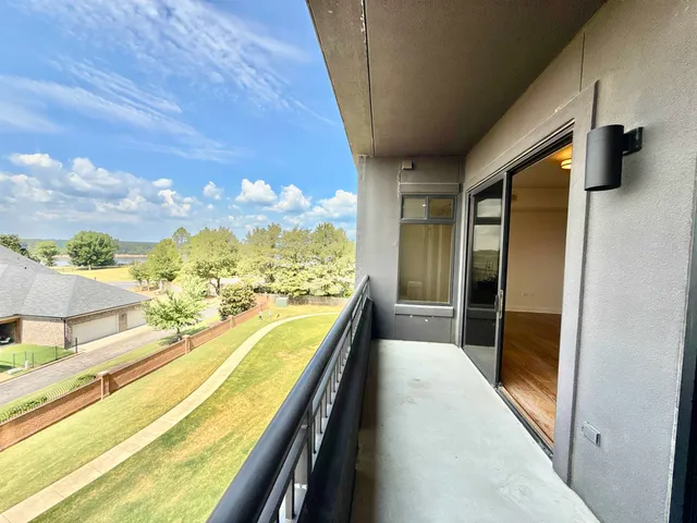 a view of swimming pool with outdoor seating