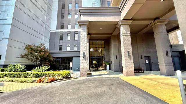 a view of a building with a garden