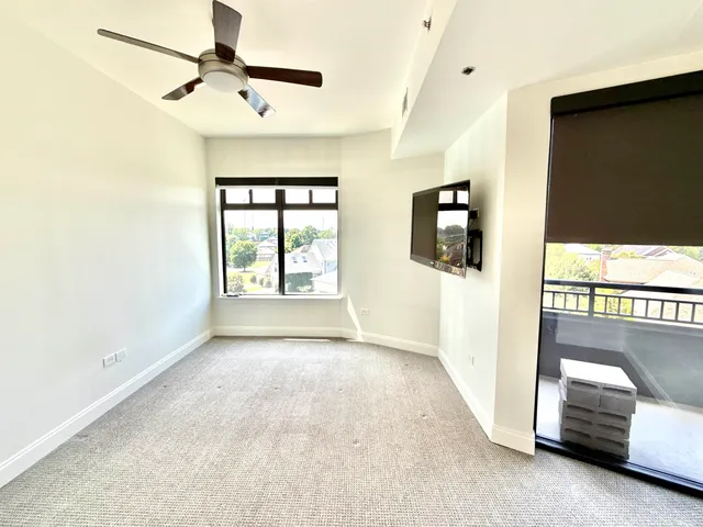 a view of a livingroom with a staircase