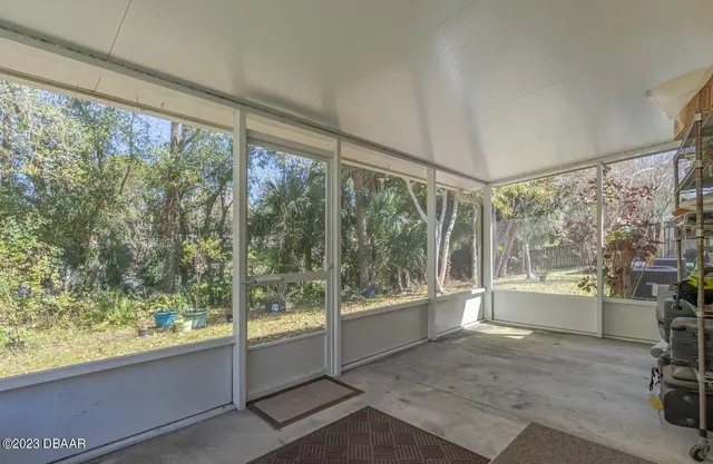 a bathroom with a large tub and shower