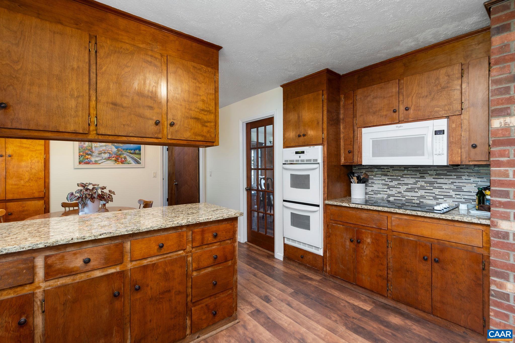 77 Sunset Drive Arrington, VA 22922 - Photo 11 of 35 a kitchen with stainless steel appliances granite countertop a sink and cabinets
