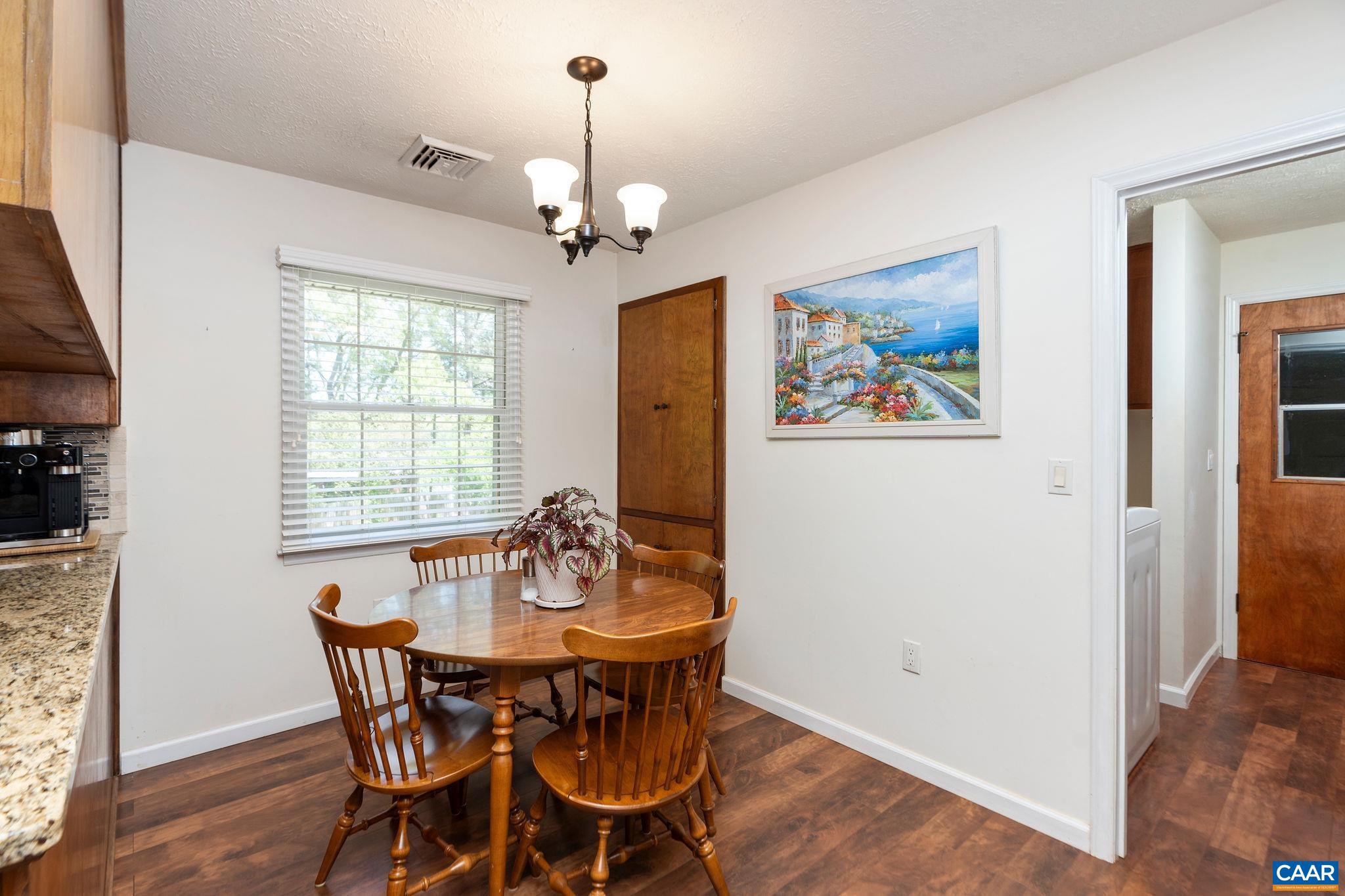 77 Sunset Drive Arrington, VA 22922 - Photo 12 of 35 a view of a dining room with furniture window and wooden floor