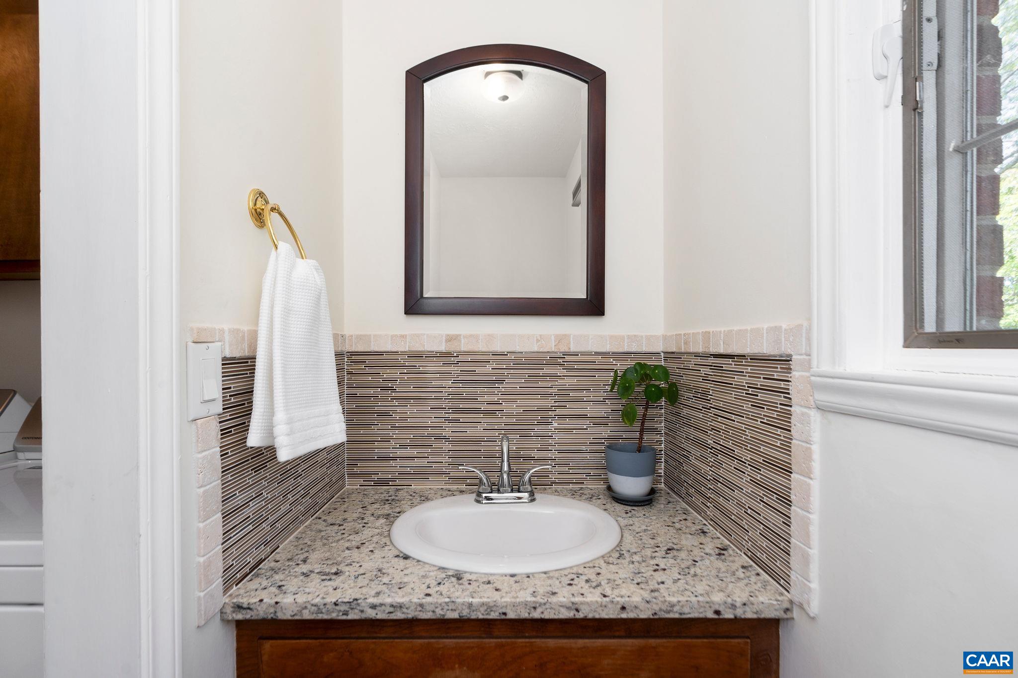 77 Sunset Drive Arrington, VA 22922 - Photo 14 of 35 a bathroom with a granite countertop sink and a mirror