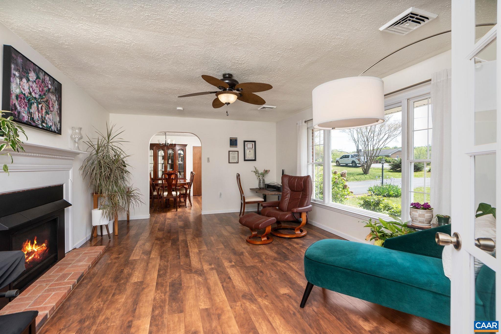 77 Sunset Drive Arrington, VA 22922 - Photo 16 of 35 a living room with furniture and a fireplace