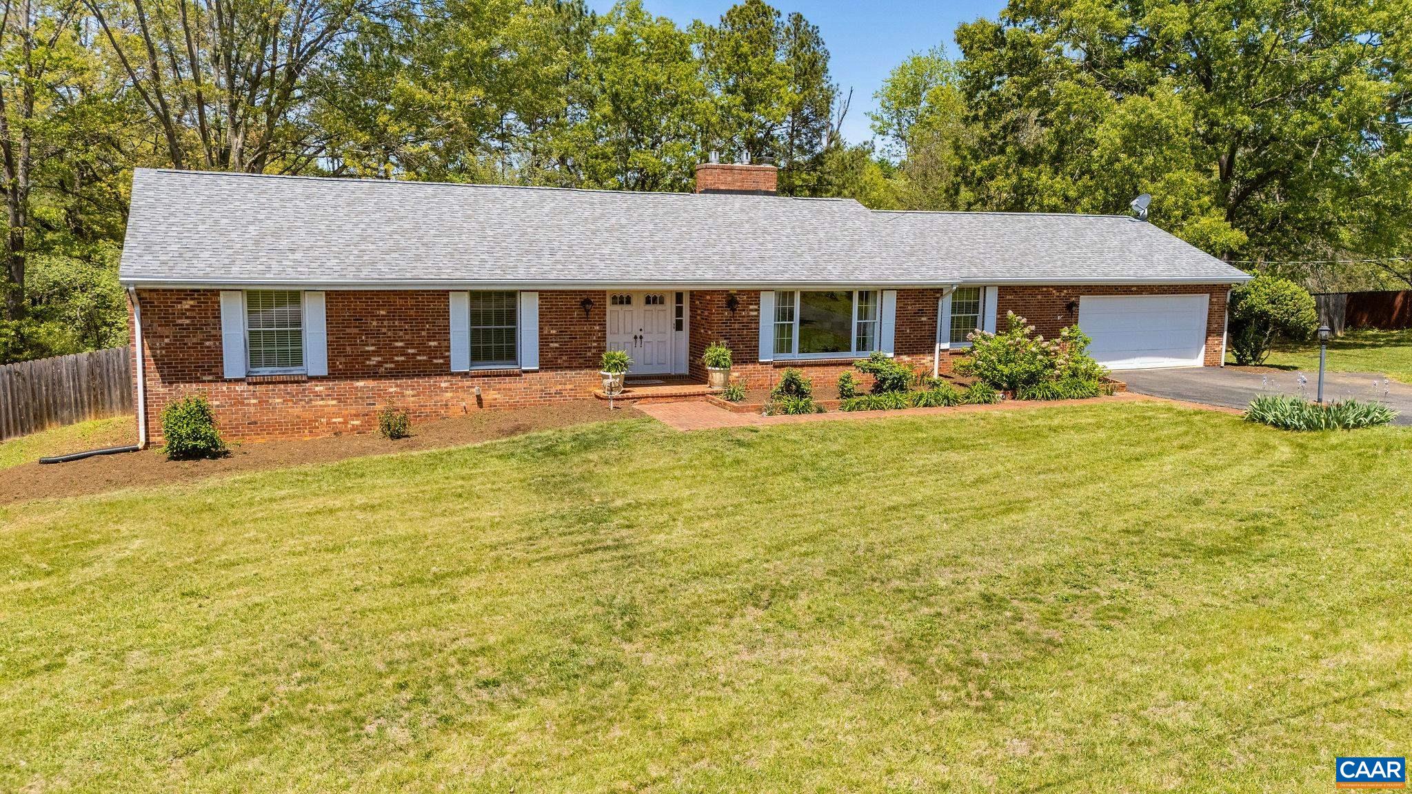 77 Sunset Drive Arrington, VA 22922 - Photo 2 of 35 a front view of a house with a yard