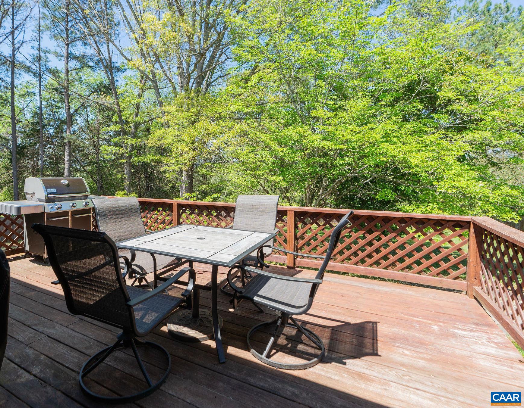 77 Sunset Drive Arrington, VA 22922 - Photo 27 of 35 a view of a chairs and table on the deck