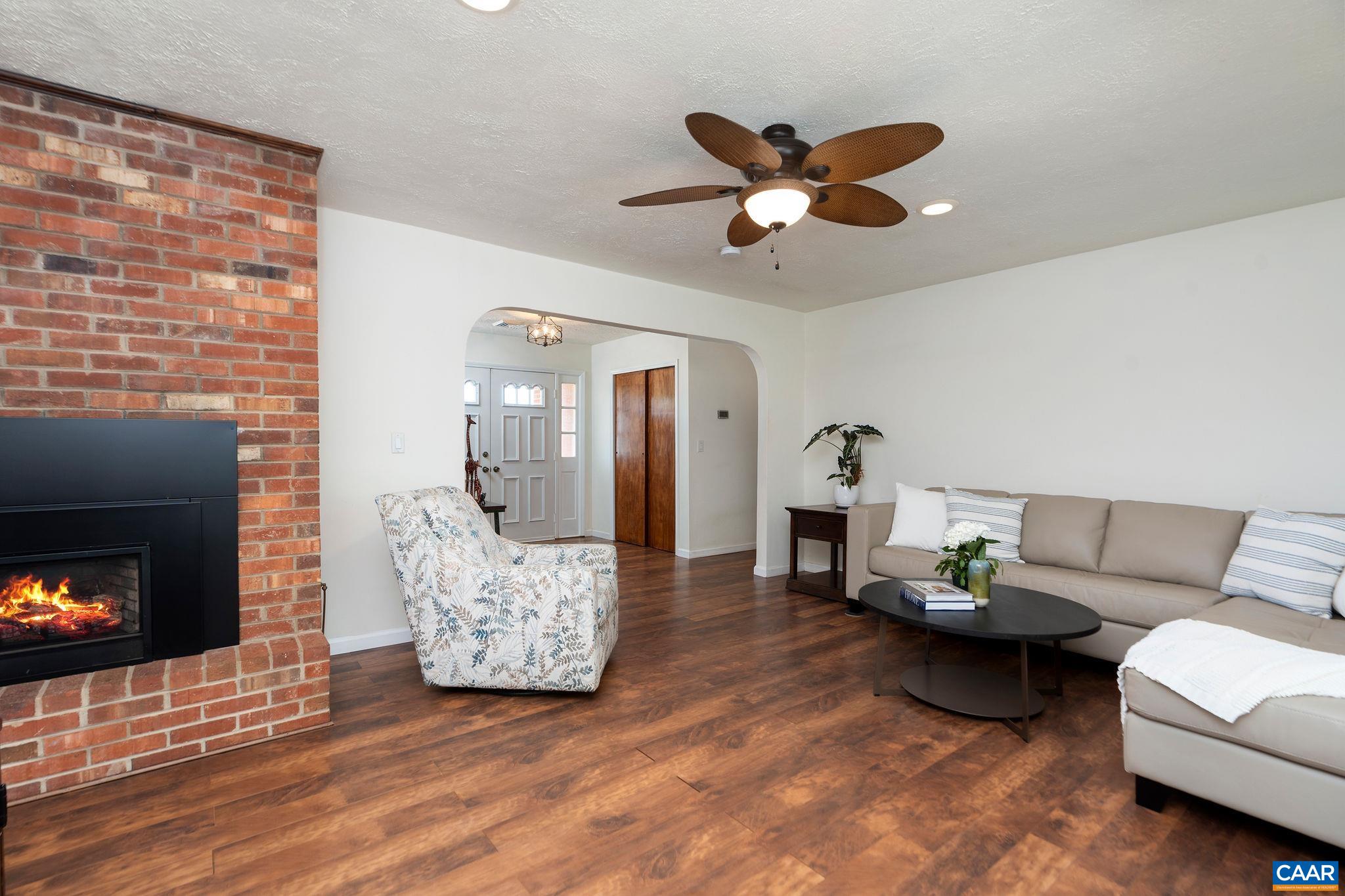 77 Sunset Drive Arrington, VA 22922 - Photo 7 of 35 a living room with furniture and a fireplace