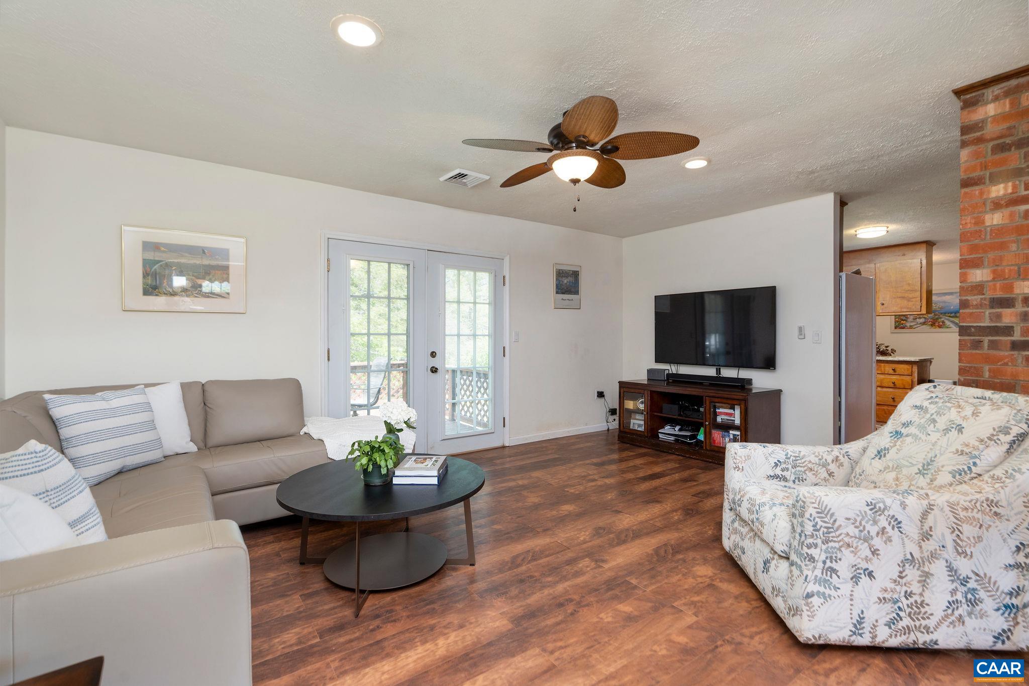 77 Sunset Drive Arrington, VA 22922 - Photo 8 of 35 a living room with furniture and a flat screen tv