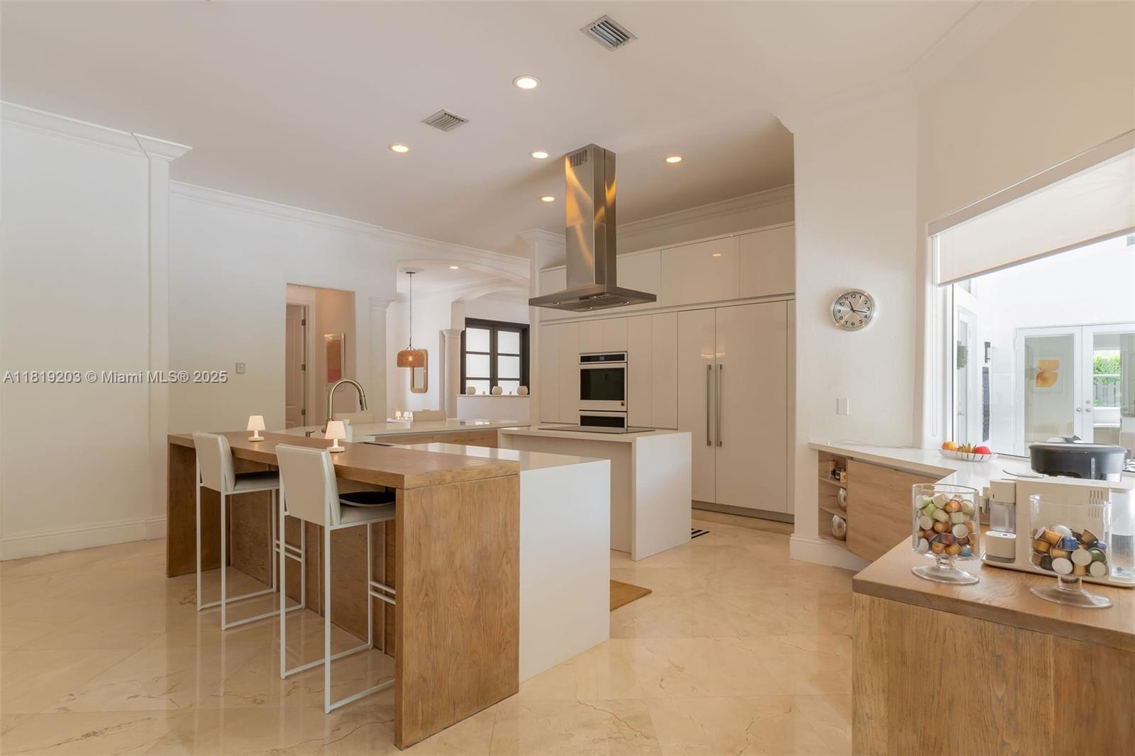 9532 Southwest 124th Terrace Miami, FL 33176 - Photo 7 of 30 a large kitchen with a table and chairs