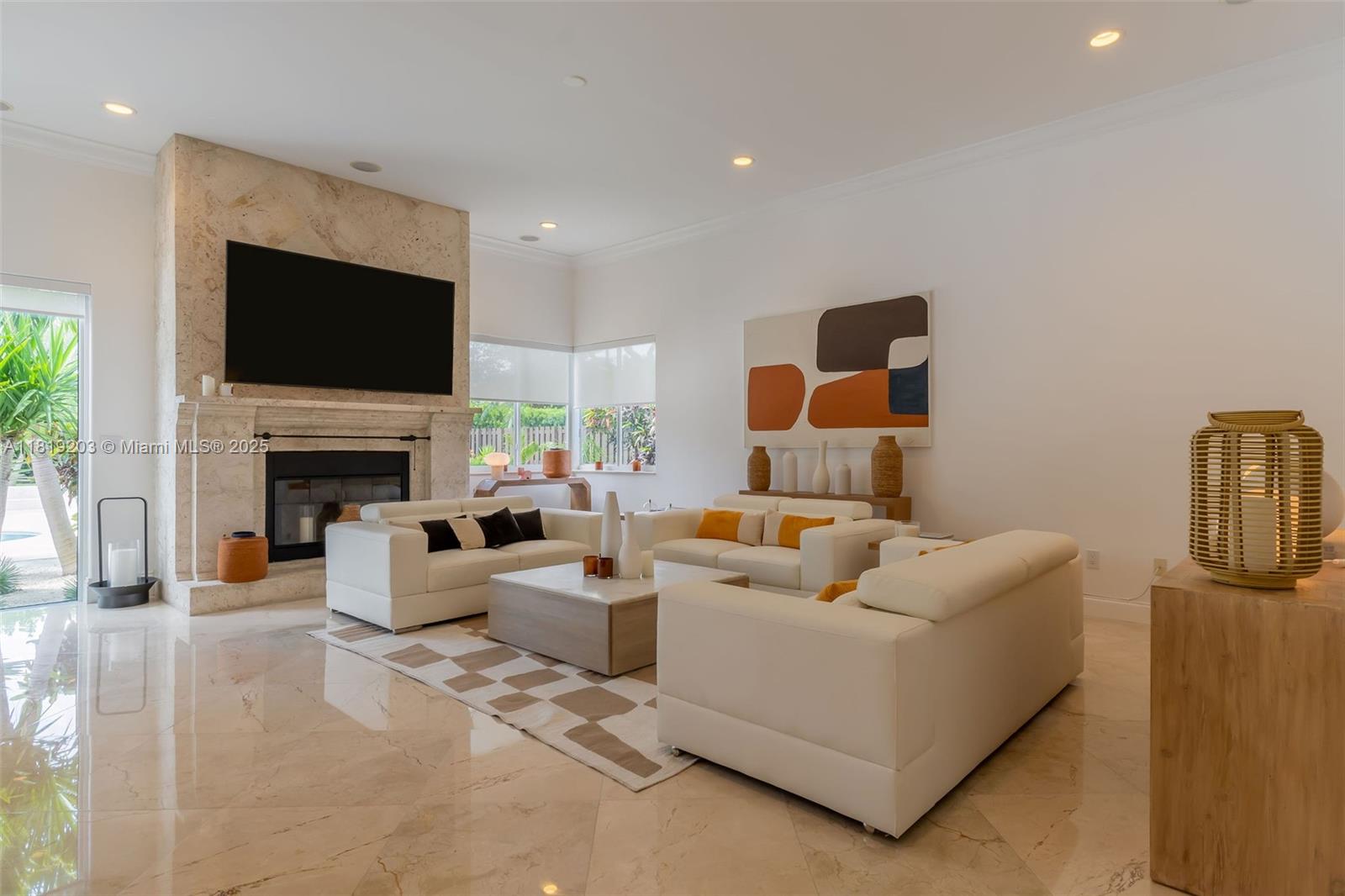 9532 Southwest 124th Terrace Miami, FL 33176 - Photo 8 of 30 a living room with furniture fireplace and flat screen tv