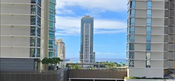 a view of a city with tall buildings