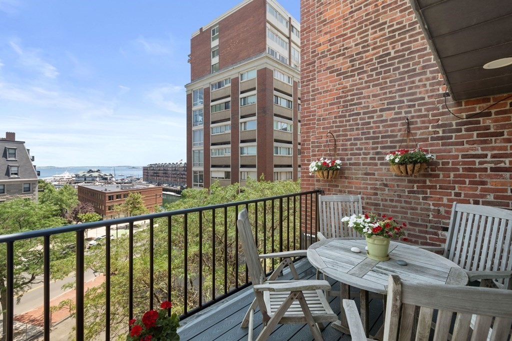 220 Commercial Street, Unit 5A Boston, MA 02109 - Photo 12 of 40 a view of a city from a balcony
