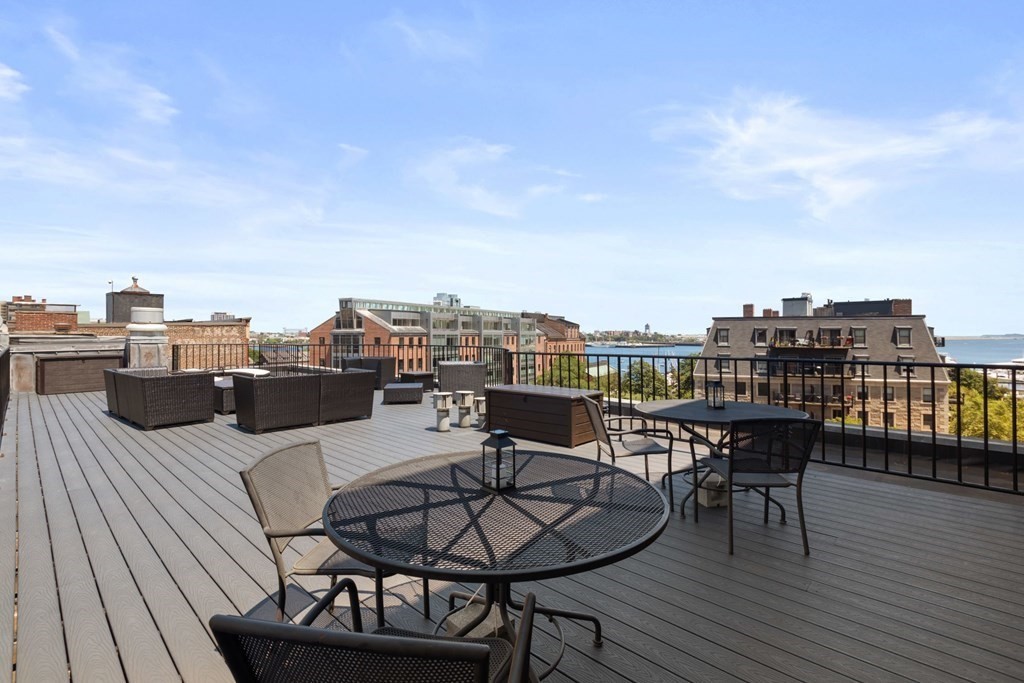 220 Commercial Street, Unit 5A Boston, MA 02109 - Photo 32 of 40 a view of a roof deck with patio