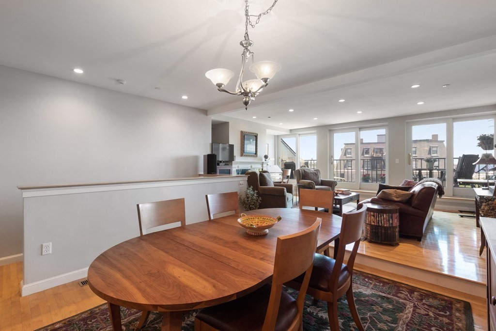 220 Commercial Street, Unit 5A Boston, MA 02109 - Photo 4 of 40 a view of a dining room with furniture