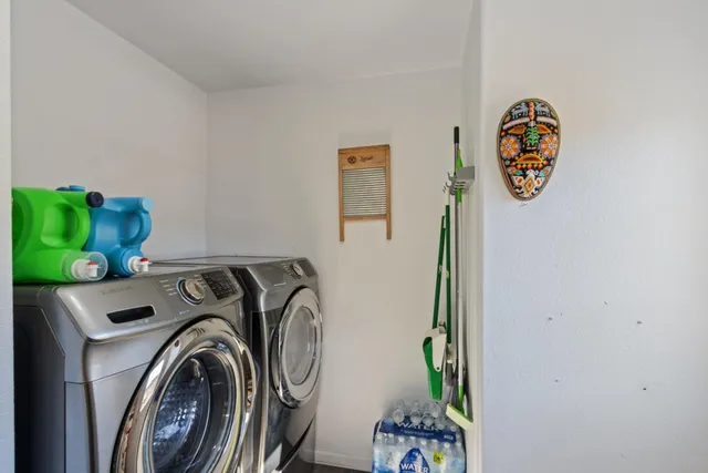 a view of a town with mountains in the background