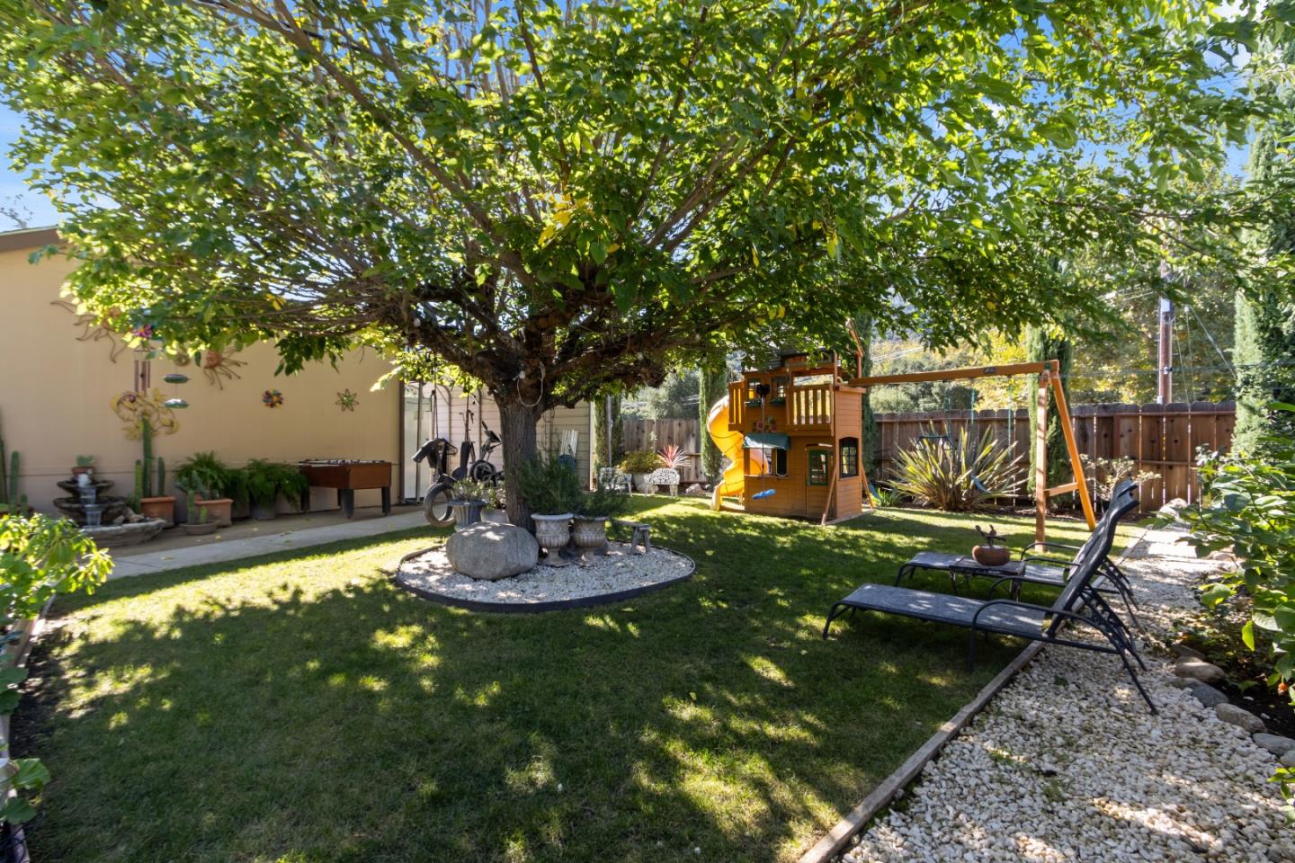 37200 Nason Road, Unit 18 Carmel Valley, CA 93924 - Photo 29 of 71 a view of a backyard with sitting area