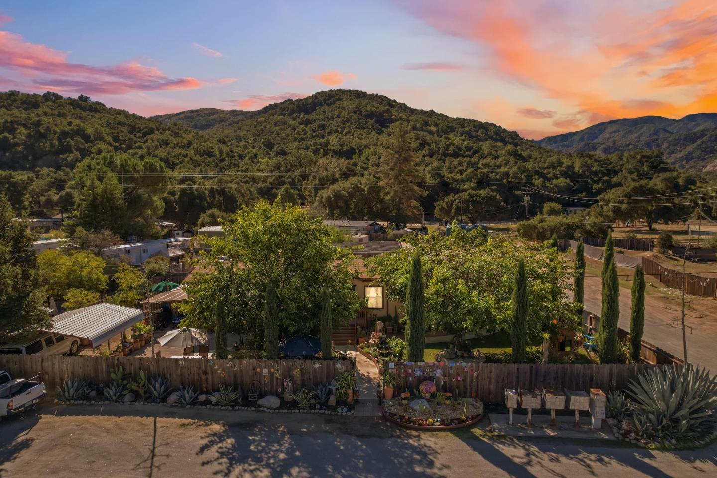 37200 Nason Road, Unit 18 Carmel Valley, CA 93924 - Photo 33 of 71 a view of a town with mountains in the background