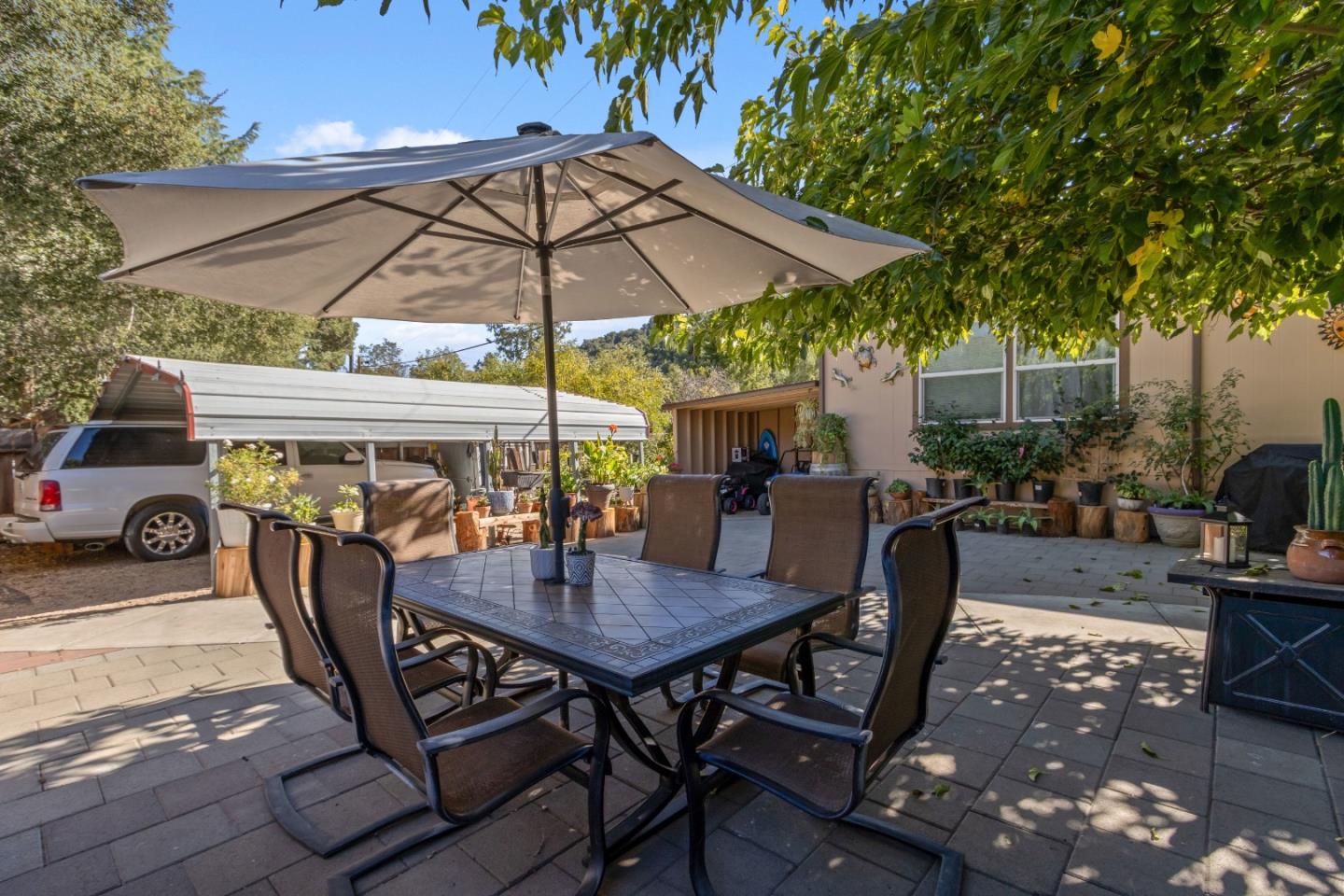 37200 Nason Road, Unit 18 Carmel Valley, CA 93924 - Photo 40 of 71 a view of backyard of house with seating space