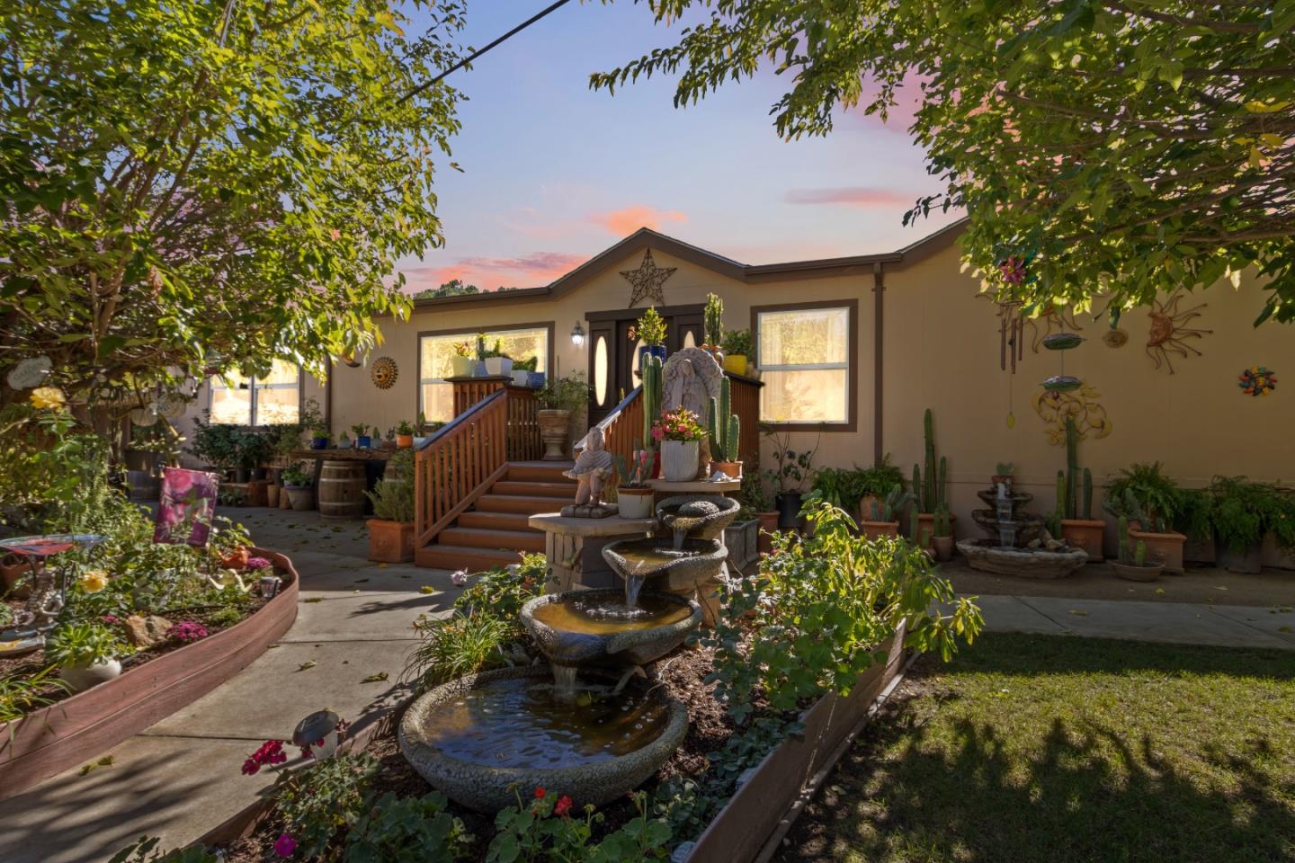 37200 Nason Road, Unit 18 Carmel Valley, CA 93924 - Photo 55 of 71 a front view of a house with a yard