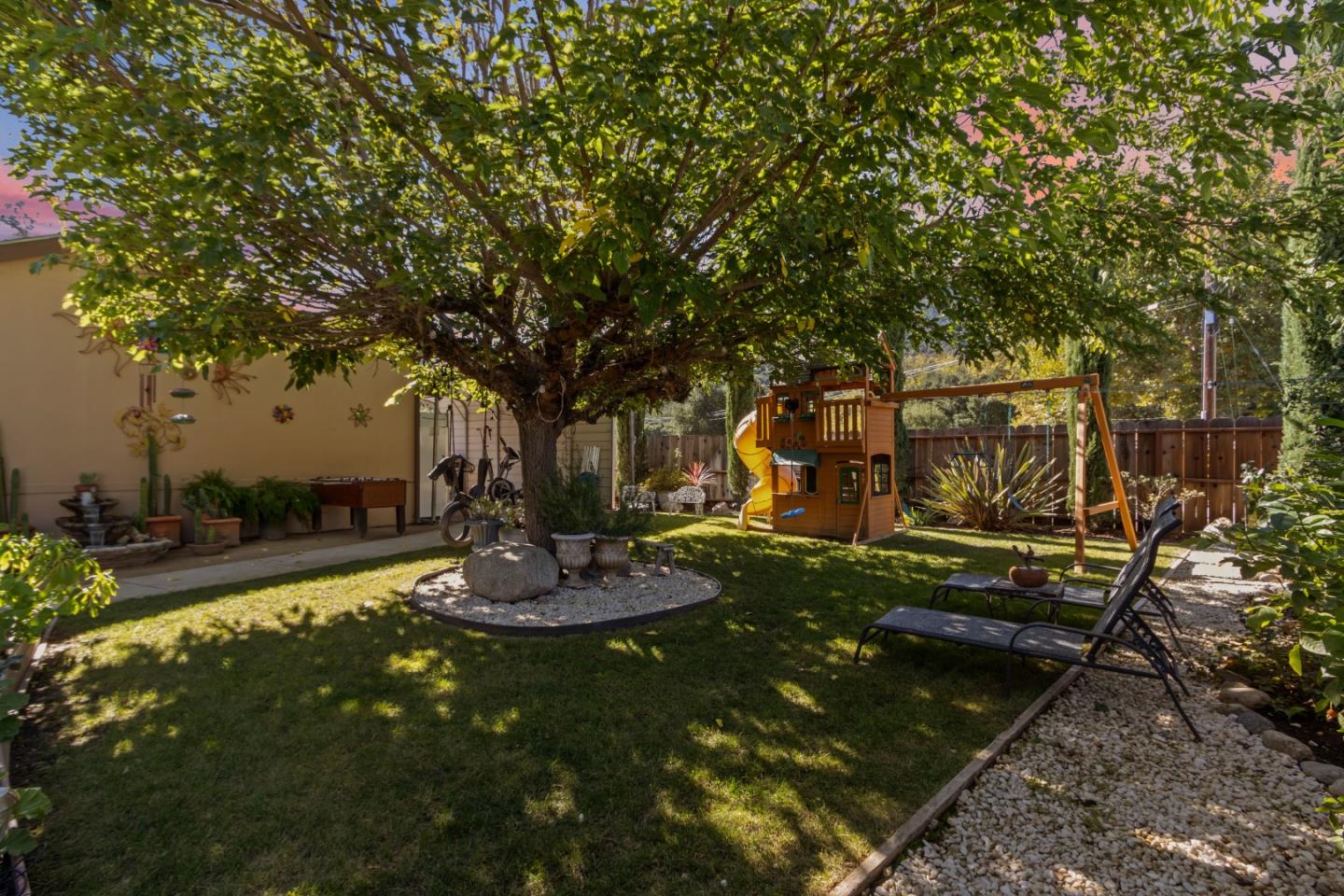 37200 Nason Road, Unit 18 Carmel Valley, CA 93924 - Photo 56 of 71 a view of a backyard with garden