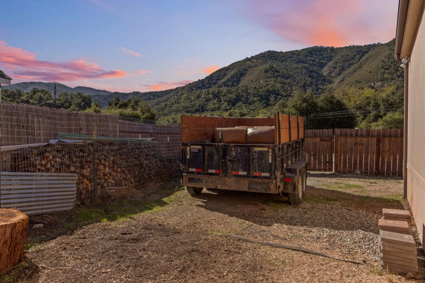 37200 Nason Road, Unit 18 Carmel Valley, CA 93924 - Photo 63 of 71 a view of balcony with wooden fence and trees