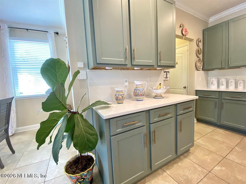 115 Sierras Loop St. Augustine, FL 32086 - Photo 19 of 65 a bathroom with a sink a mirror and vanity