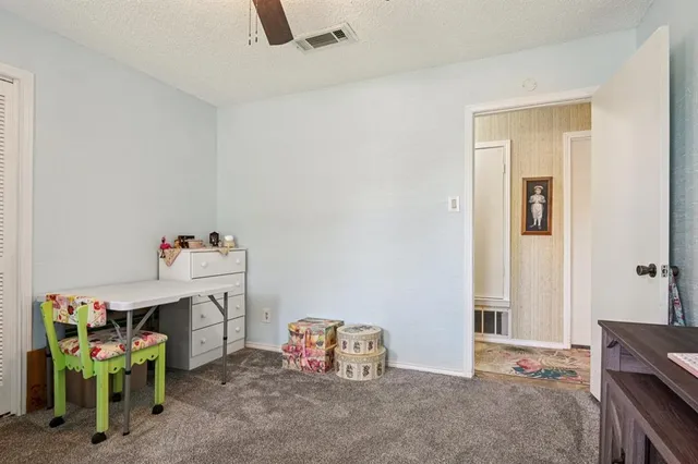 a view of room with baby crib