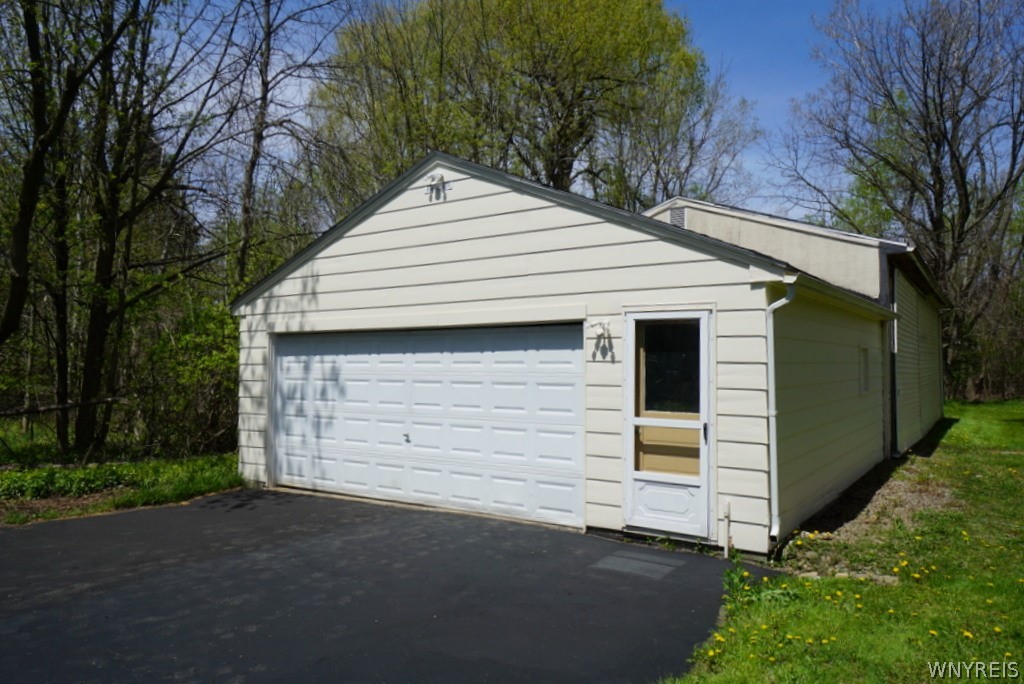 13402 Main Street Newstead, NY 14001 - Photo 15 of 17 Two car garage with pole barn addition.