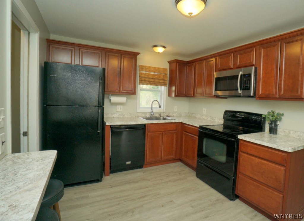 13402 Main Street Newstead, NY 14001 - Photo 3 of 17 from the mud rm to the enhanced kitchen! Appliance