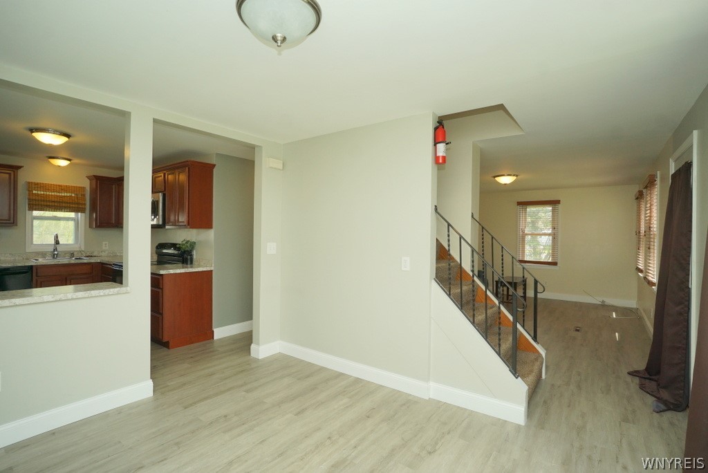 13402 Main Street Newstead, NY 14001 - Photo 6 of 17 Dining room looking into the living room.
