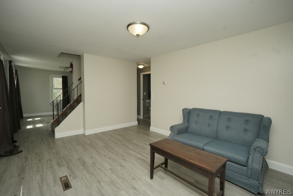 13402 Main Street Newstead, NY 14001 - Photo 9 of 17 Looking into the dinning room and entry to the bat