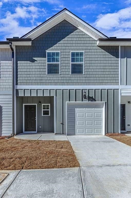 4986 Lower Elm Street, Unit 35 Atlanta, GA 30349 - Photo 1 of 1 a front view of a house