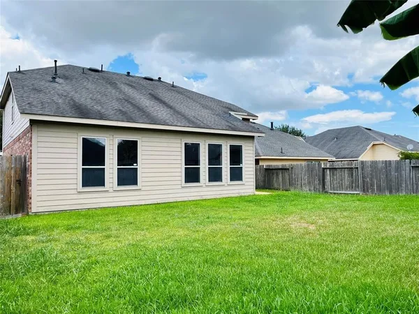 a house view with a garden space