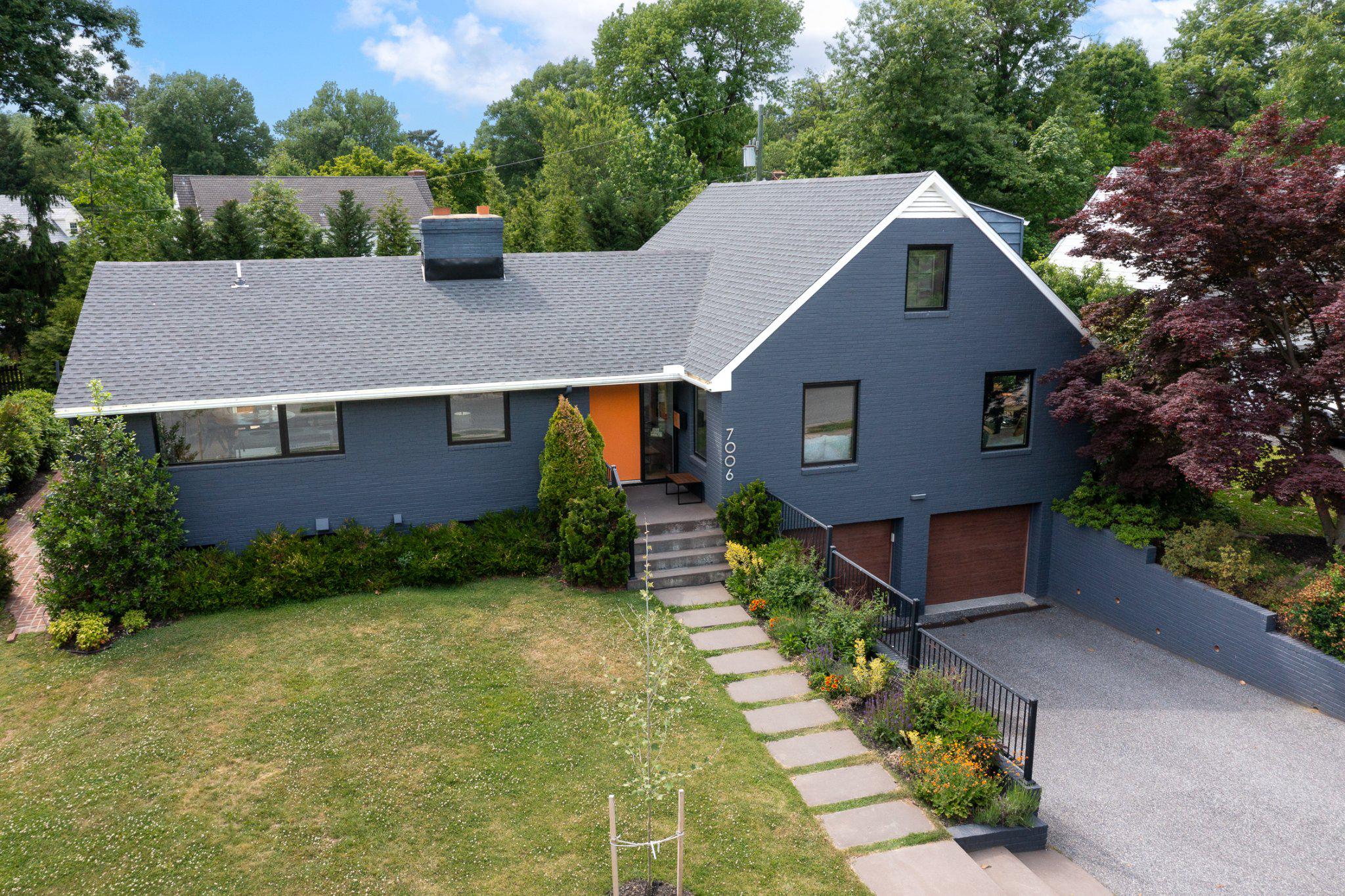 7006 Copeleigh Road Baltimore, MD 21212 - Photo 1 of 43 a aerial view of a house with a yard plants and large tree